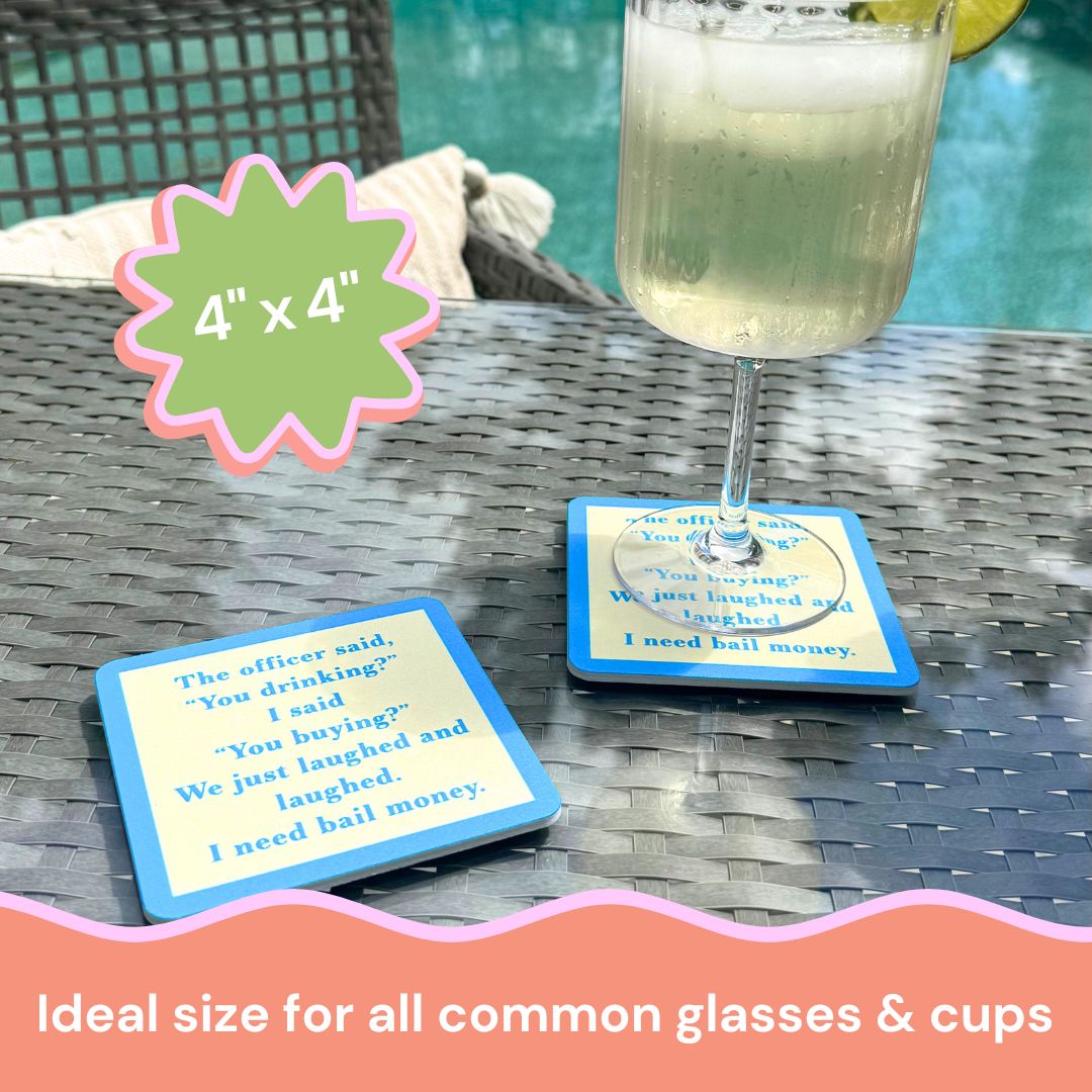 A drink with a lime wedge rests on the “You Drinking?” coaster by Drinks On Me, featuring humorous bail money text. Another matching coaster is nearby. 4x4 size fits all glasses—perfect for housewarmings or bar carts.