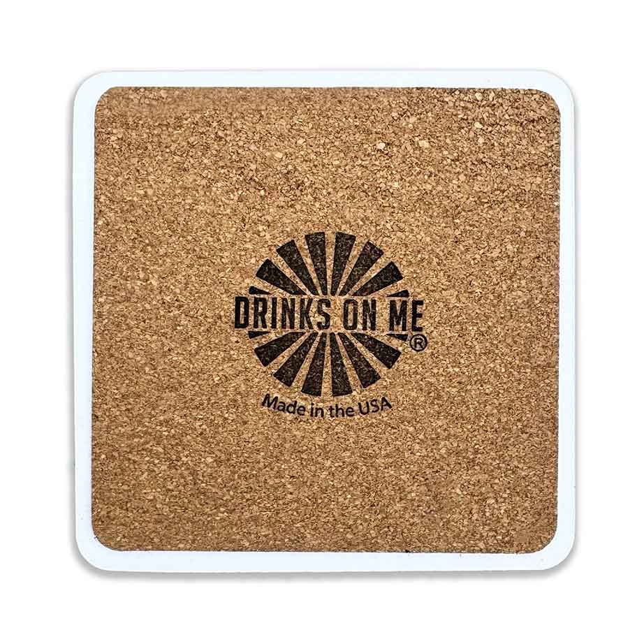 The Now I Wait Coaster by Drinks On Me is a square cork coaster with a white border, featuring a black sunburst design and "Now I Wait" text—perfect as bar cart decor or housewarming gift. Made in the USA printed below.