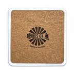 The Now I Wait Coaster by Drinks On Me is a square cork coaster with a white border, featuring a black sunburst design and "Now I Wait" text—perfect as bar cart decor or housewarming gift. Made in the USA printed below.